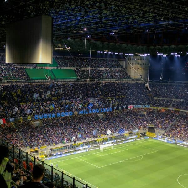 a stadium full of people watching a soccer game